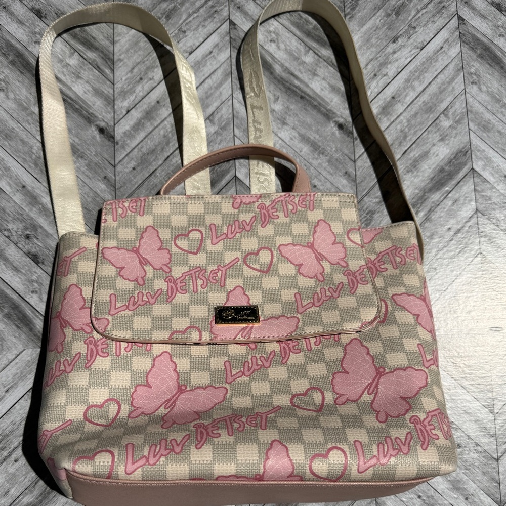 Betsey Johnson overnight bag/backpack checkered background with butterflies.